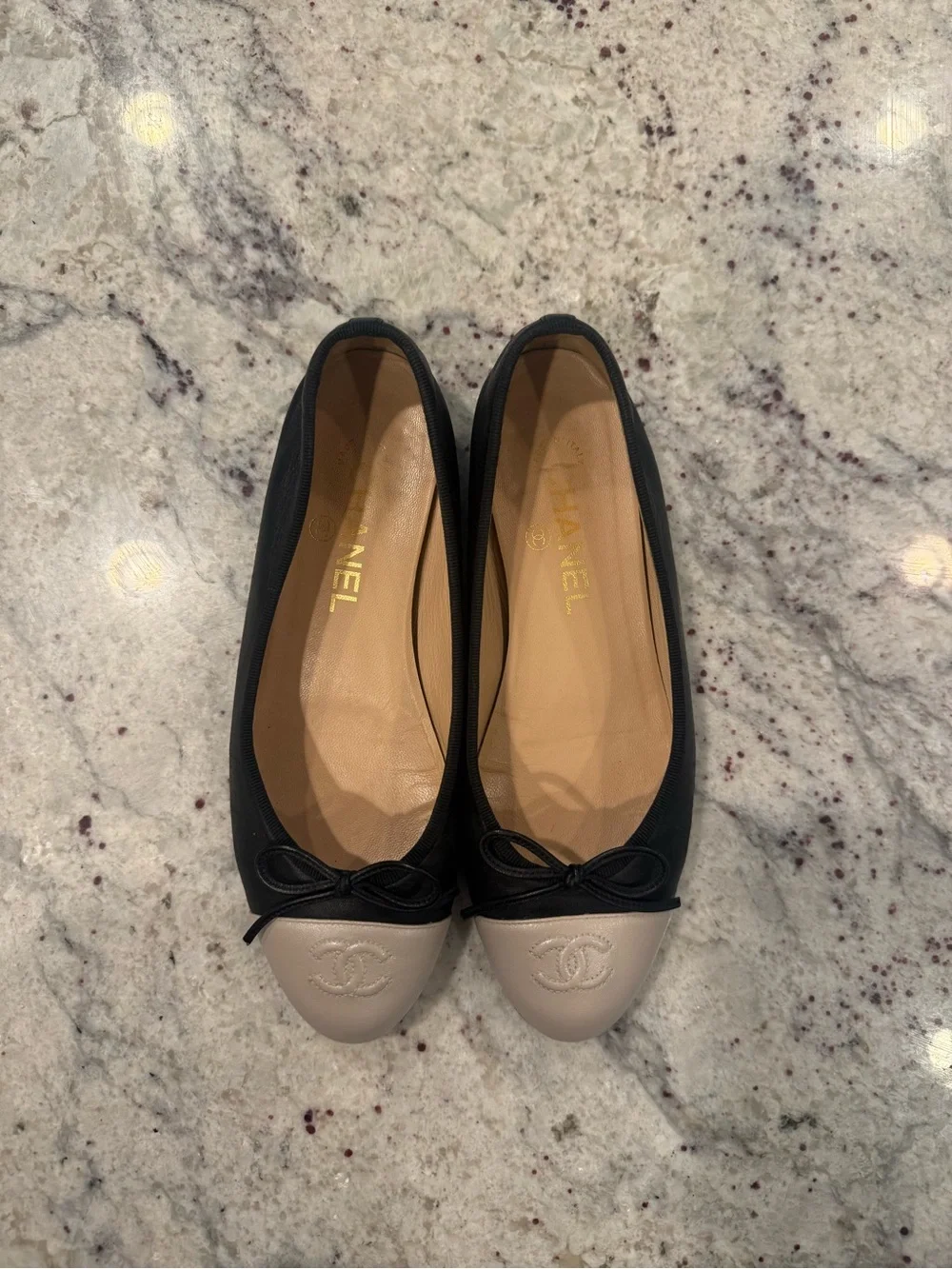 CHANEL Black Leather Ballet Flats with Cream Cap Toe size 7
